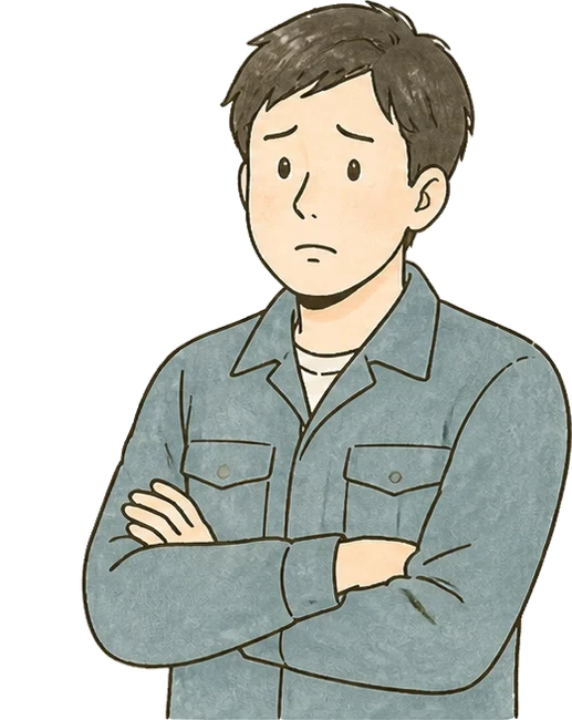腕を組み慎重に考える男性